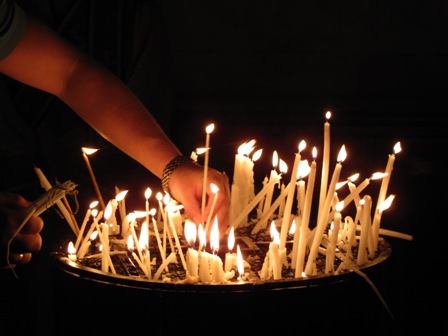 Tours in Jerusalem withe Yishay Shavit - Candles in The Church of the Holy Sepulchre